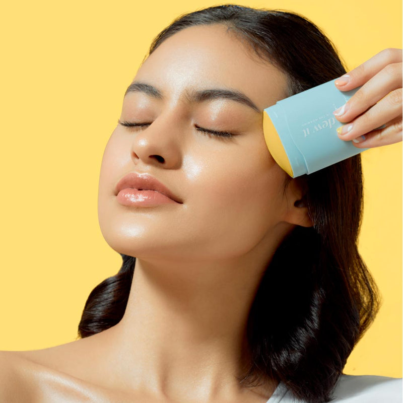 Afraid of dark spots and dull skin? Introducing Dew It In The Morning Face Sun Stick complete with SPF 50+ and PA++++.  This fast absorbing, non-comedogenic, water and sweat-resistant formula provides high-performance protection from UVA, UVB, and IRA rays and supports skin from photo-aging and dehydration.  With super light-weight texture that is easy-to-blend, it gives you a clear, no white-cast, non greasy feel for a beautiful, dewy look. Rain or shine, Dew It in the morning!